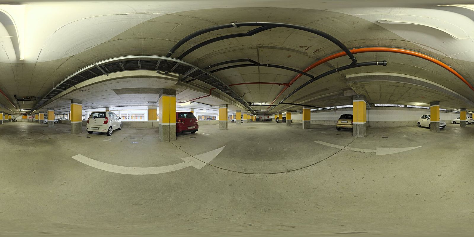 Company vehicles in the parking garage